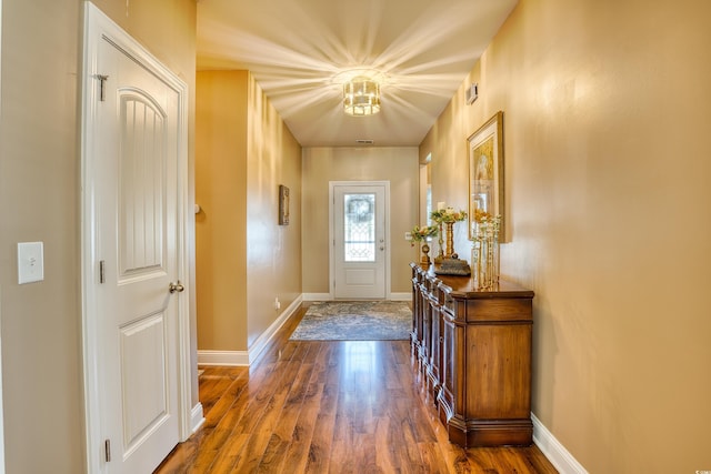 entryway with dark hardwood / wood-style floors