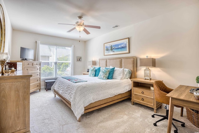 bedroom featuring ceiling fan and light colored carpet