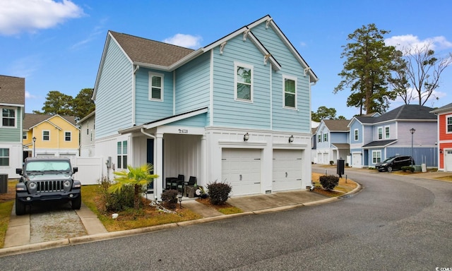 view of front of property featuring a garage