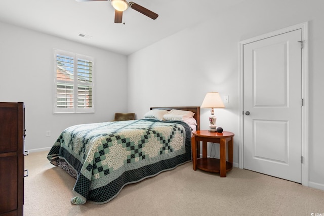 bedroom featuring carpet and ceiling fan