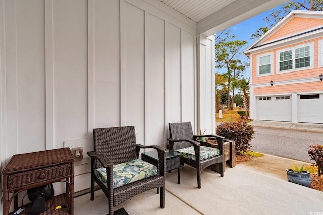 view of patio featuring a garage