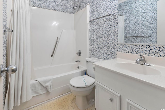 full bathroom featuring shower / tub combo, vanity, and toilet