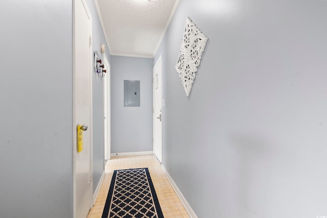 hall featuring a textured ceiling, crown molding, and electric panel