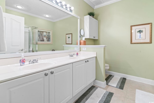 bathroom featuring vanity, a shower with door, tile patterned floors, crown molding, and toilet