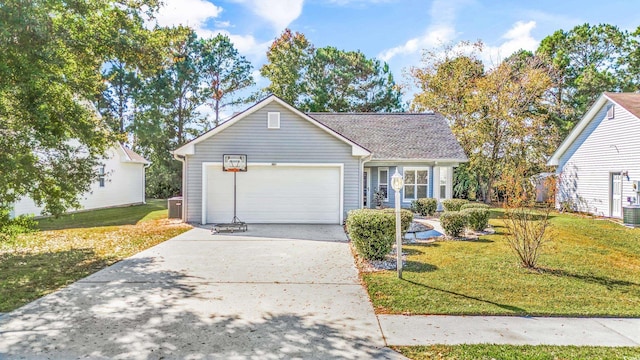 view of front of house featuring a front lawn, central AC unit, and a garage