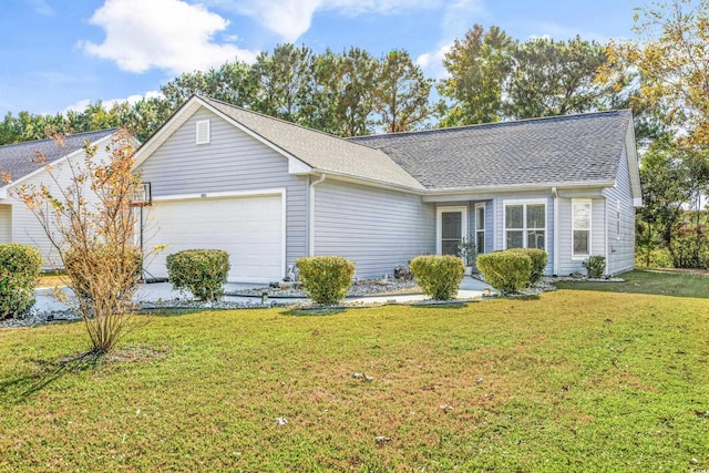 single story home featuring a front yard and a garage