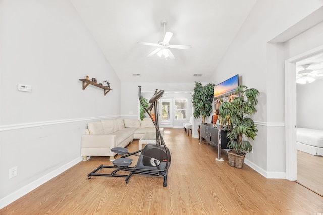 interior space with light hardwood / wood-style flooring, ceiling fan, and lofted ceiling