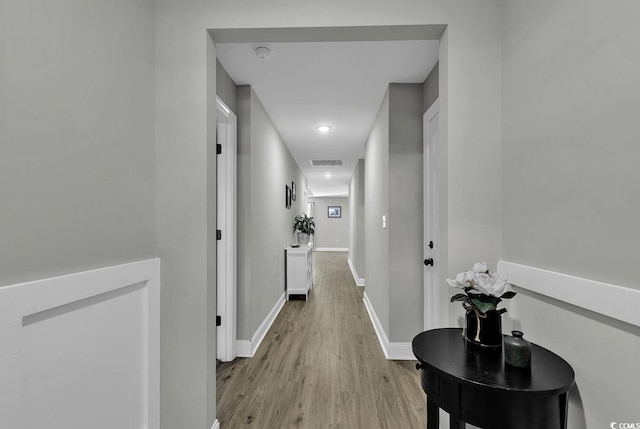 hallway featuring light hardwood / wood-style floors