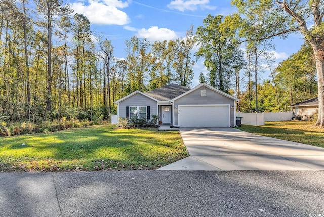 ranch-style home featuring a garage and a front lawn