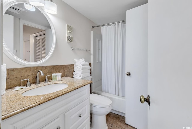 full bathroom with decorative backsplash, shower / tub combo, tile patterned floors, vanity, and toilet