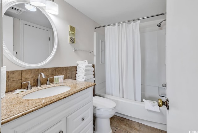 full bathroom featuring vanity, tile patterned floors, toilet, tasteful backsplash, and shower / tub combo with curtain