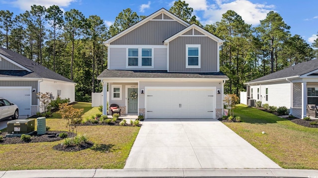 craftsman-style home with a garage, central air condition unit, and a front yard