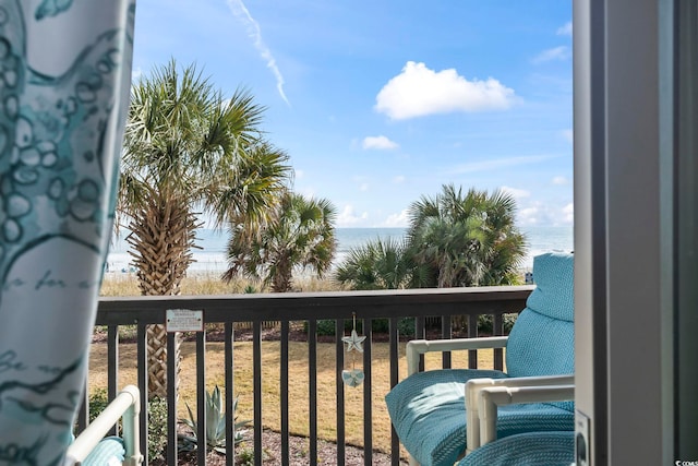 balcony featuring a water view