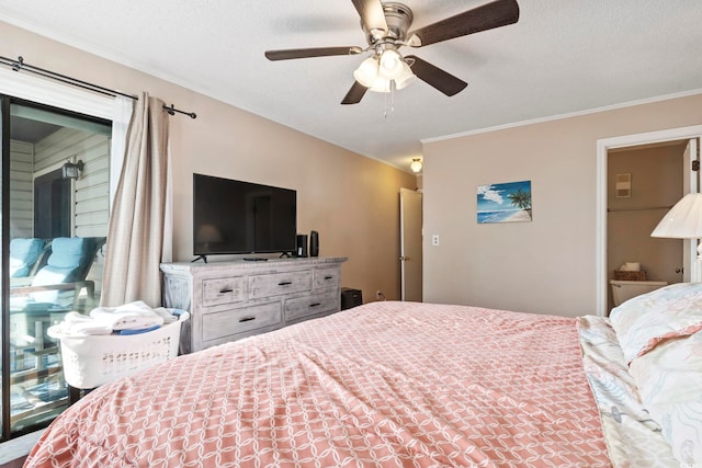 bedroom featuring a textured ceiling, ceiling fan, and crown molding