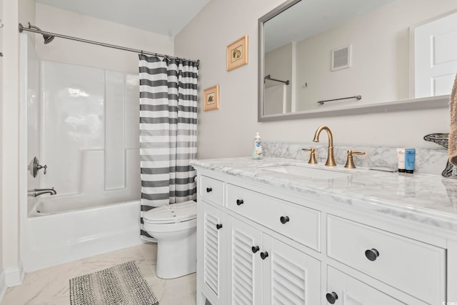 full bathroom featuring shower / bath combo, toilet, and vanity