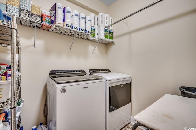 washroom featuring independent washer and dryer