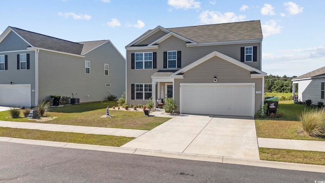 view of front of house featuring central air condition unit, a front lawn, and a garage