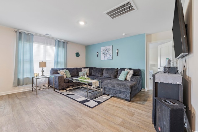 living room featuring light wood-type flooring