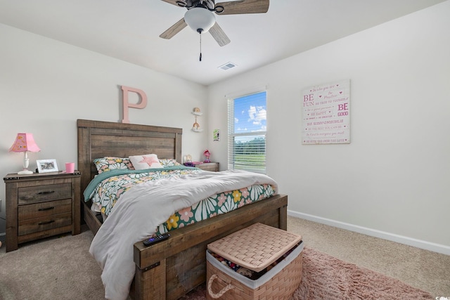 bedroom with ceiling fan and light colored carpet