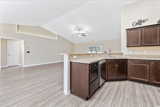 kitchen featuring sink, light hardwood / wood-style flooring, stainless steel dishwasher, ceiling fan, and light stone counters