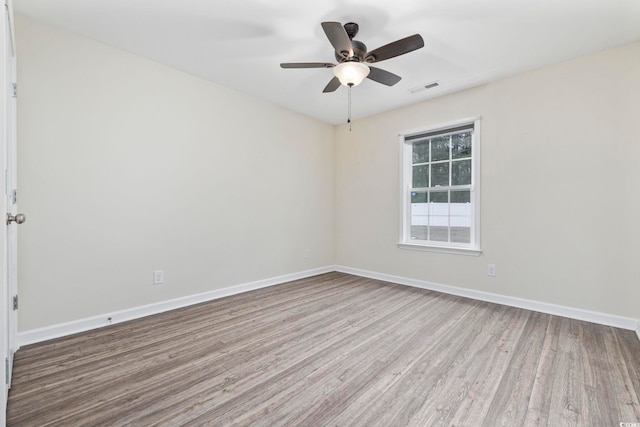 unfurnished room featuring wood-type flooring and ceiling fan