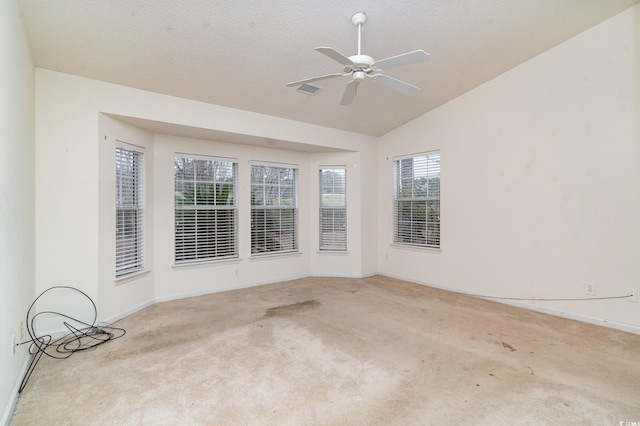 interior space with ceiling fan and lofted ceiling