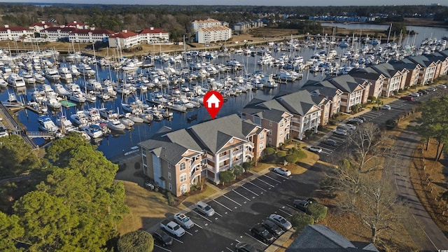 drone / aerial view with a water view