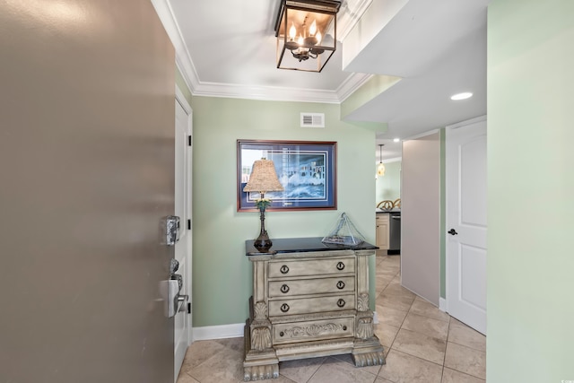 corridor with light tile patterned flooring and crown molding