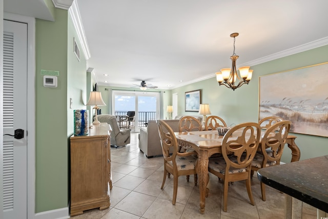 dining room with crown molding, light tile patterned flooring, and ceiling fan with notable chandelier