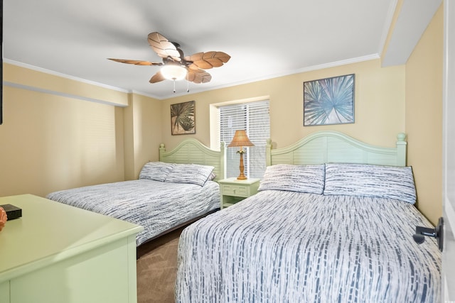 bedroom with carpet flooring, ceiling fan, and ornamental molding