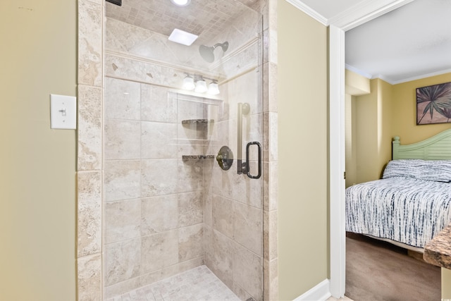 bathroom featuring ornamental molding and a shower with shower door