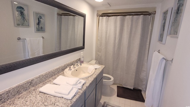 bathroom with tile patterned flooring, vanity, toilet, and a shower with curtain