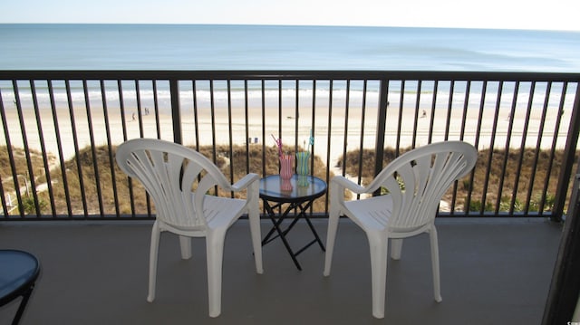 4719 S Ocean Blvd Unit 609, North Myrtle Beach, SC 29582 - balcony featuring view of water and beach