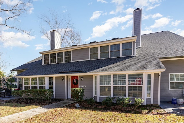 view of front of house with a front lawn