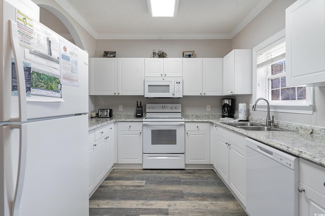 kitchen featuring crown molding, sink, white cabinets, and white appliances