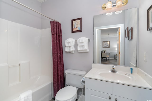 full bathroom featuring vanity, shower / bathtub combination with curtain, and toilet