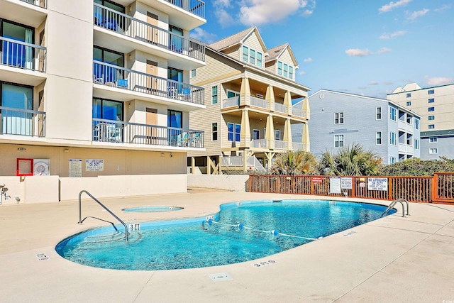 view of swimming pool featuring a patio