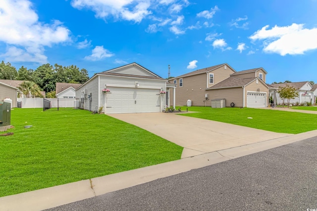 view of front of home featuring a garage and a front lawn