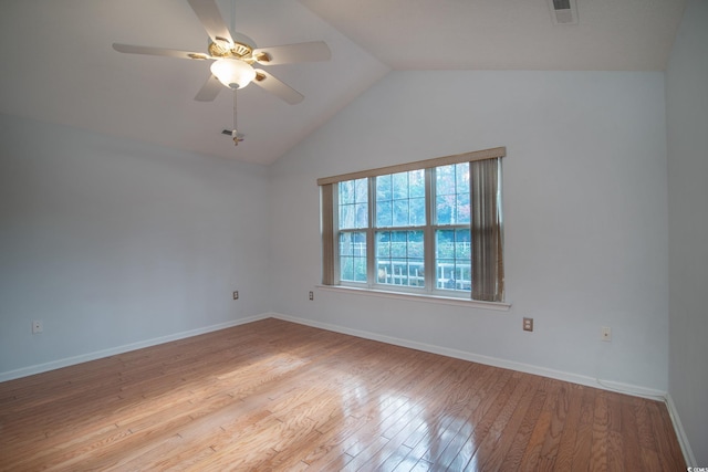 unfurnished room with light hardwood / wood-style floors, ceiling fan, and lofted ceiling