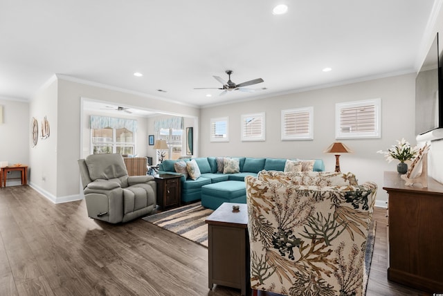 living room featuring recessed lighting, a ceiling fan, baseboards, and wood finished floors