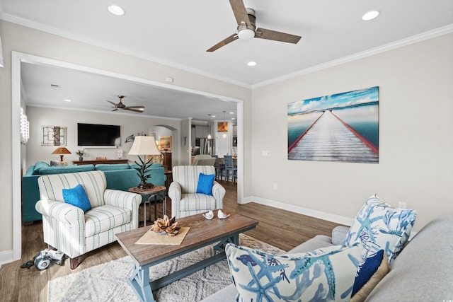 6550 Anterselva Dr, Myrtle Beach, SC 29572 - living area with a ceiling fan, wood finished floors, baseboards, recessed lighting, and ornamental molding