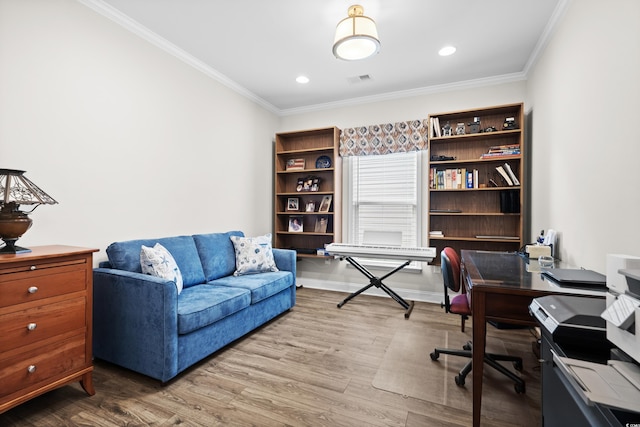 home office featuring crown molding, recessed lighting, wood finished floors, and visible vents