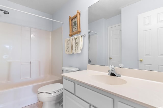 full bathroom with a textured ceiling, vanity, shower / bathtub combination, and toilet