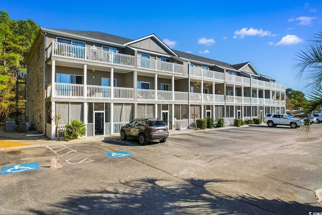 view of property featuring central AC unit