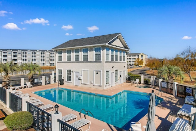 view of swimming pool featuring a patio