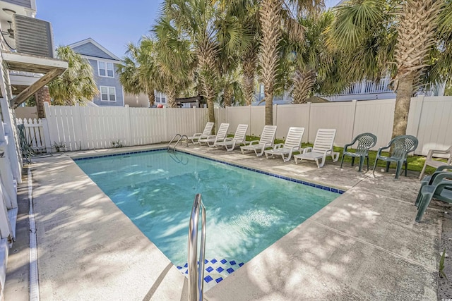 view of swimming pool featuring a patio