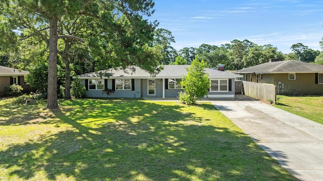 ranch-style house with a front lawn