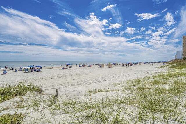 property view of water featuring a beach view