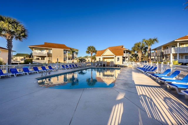 view of swimming pool featuring a patio