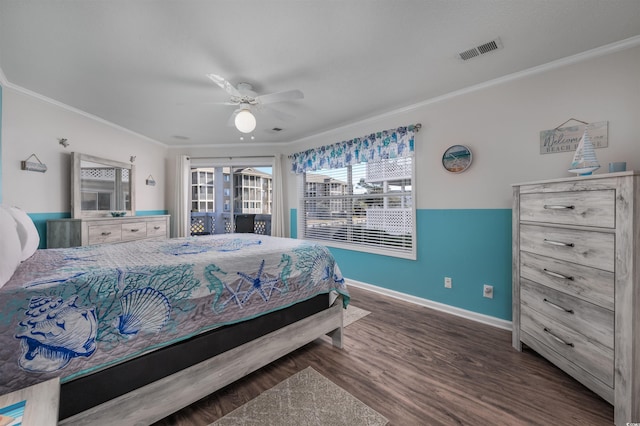 bedroom featuring ceiling fan, dark hardwood / wood-style flooring, and crown molding